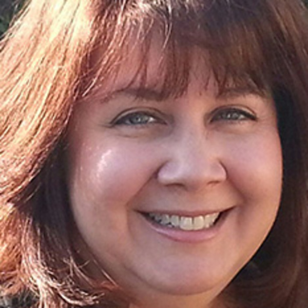 Portrait of Carrie Michaels, LMFT, a Deaf therapist at the Deaf Counseling Center